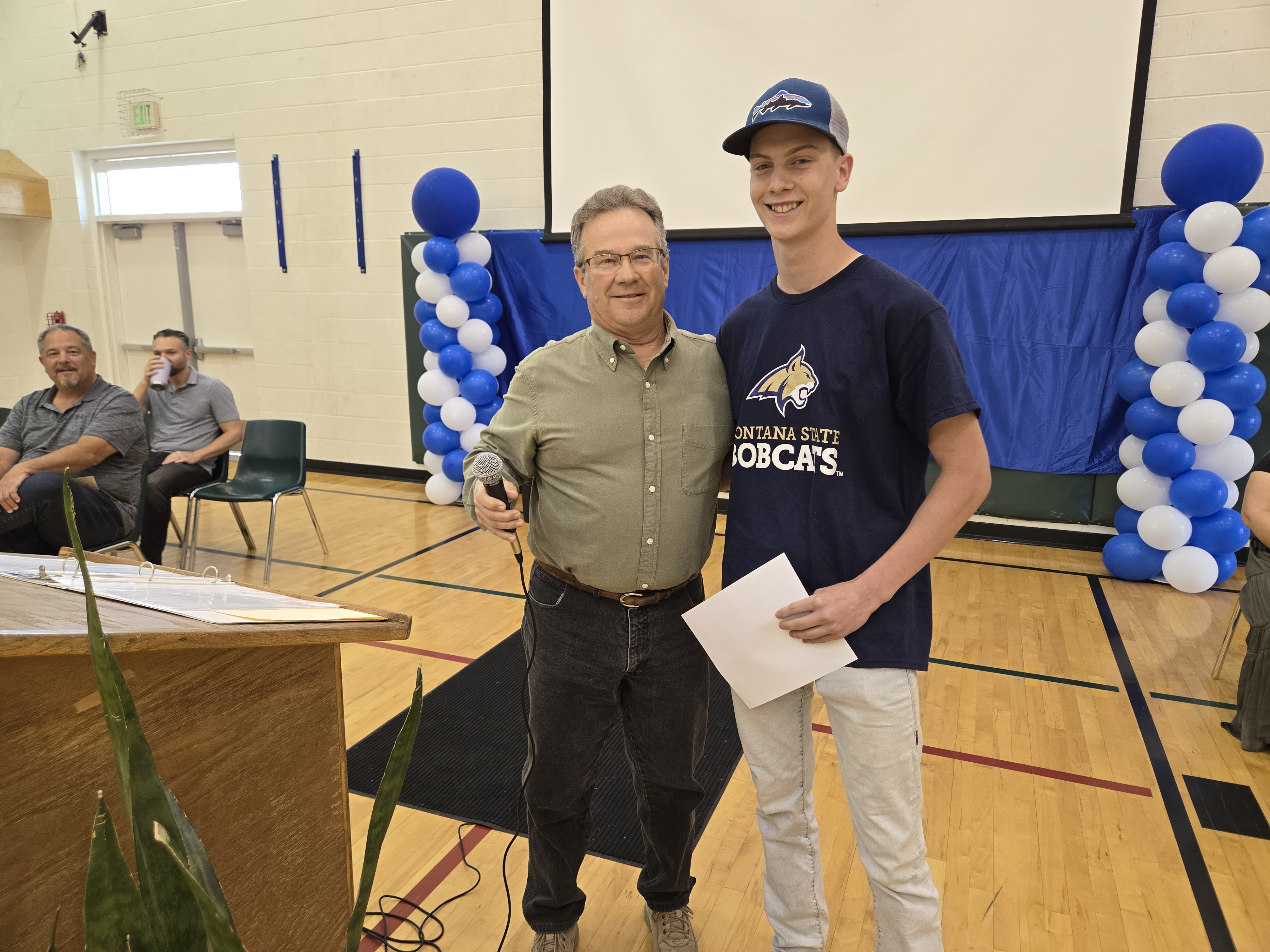ALPS President Mike Orvis presenting the scholarshop to Colin O'Hern at PCHS Scholarship Night
